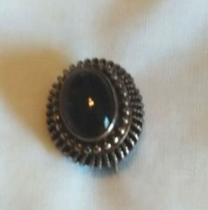 Vintage Sterling with purple stone brooch